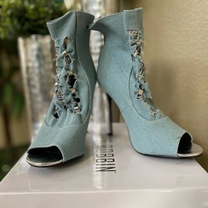 Distressed denim heels **never worn**